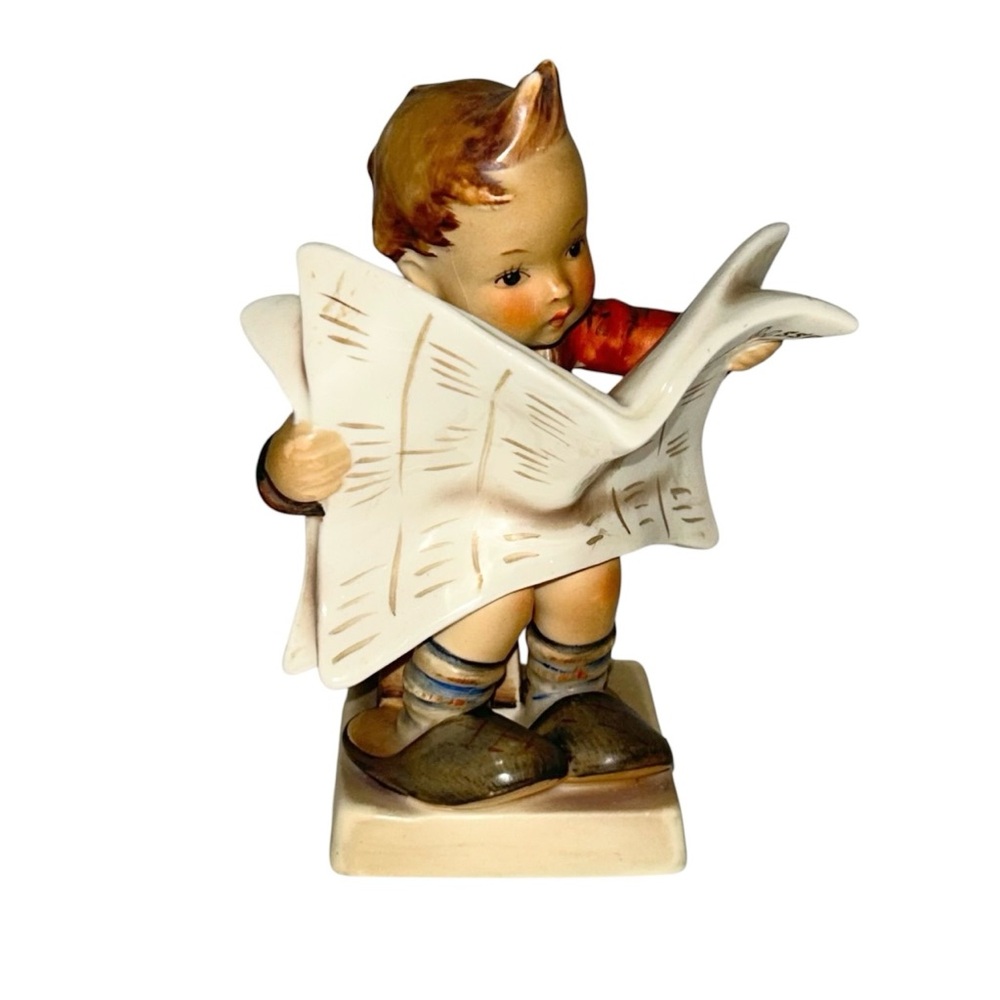M.J.HUMMEL Latest News Young boy readying the newspaper Collectible Figurine